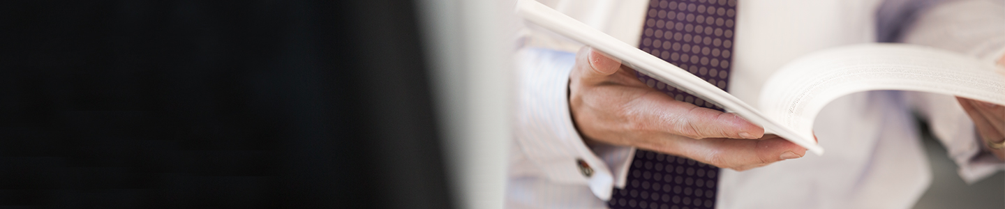  A man browsing a financial document